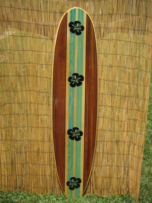 Green and Chest Stained Surfboard